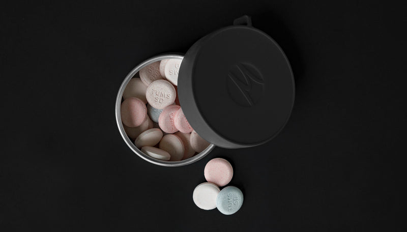 100ml Canister with open lid, showing colorful Tums tablets