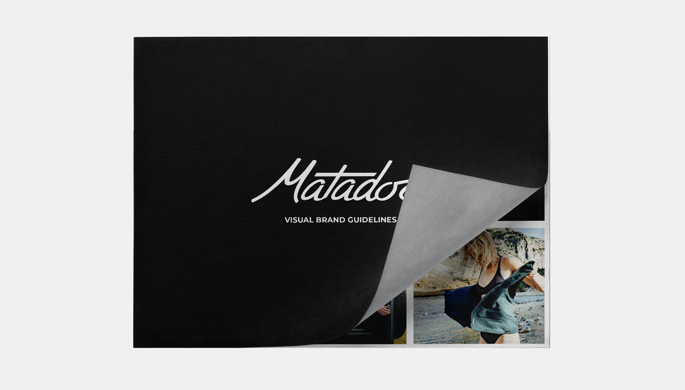 Matador Brand Guidelines booklet on light gray background