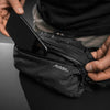 Placing cell phone in hip pack front pocket