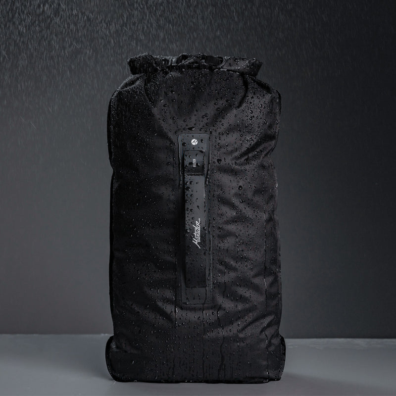 Front view of dry bag covered in water