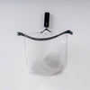 front view of open Arctic white waterproof toiletry case hanging on black hook over white background