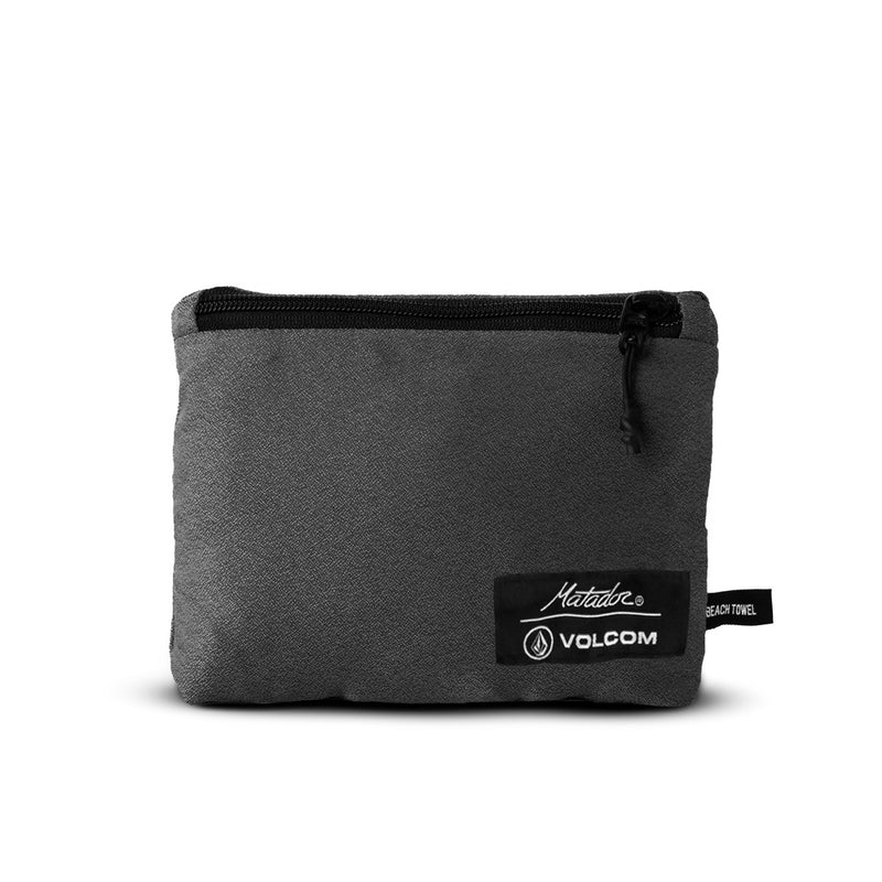packed up charcoal towel on white background