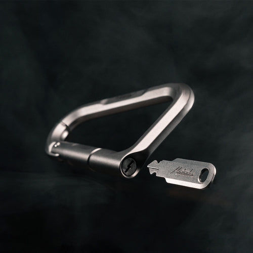 betalock on black background with view of key going into keyhole