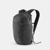 3/4 view of black backpack on light gray background