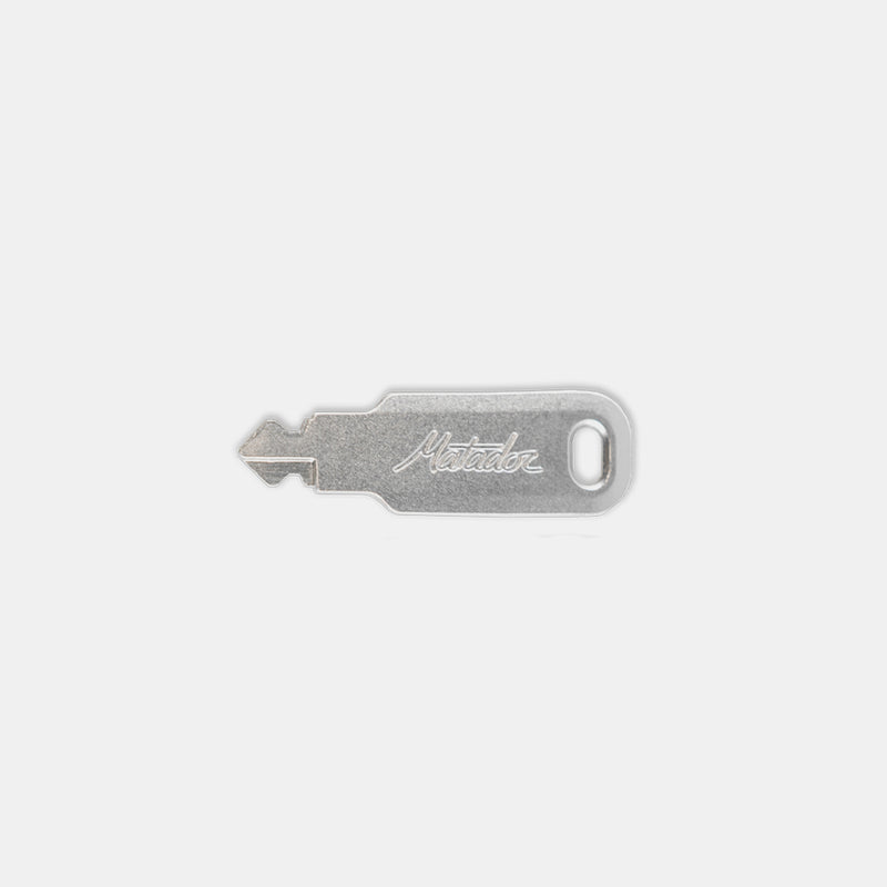 One Matador BetaLock Key on light gray background