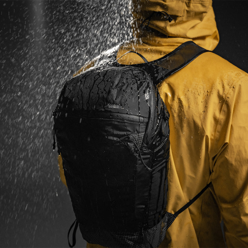Person in yellow jacket wearing Freefly16 in the rain