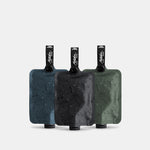 Toiletry bottle 3-pack multi1 charcoal slate and sage on light gray background
