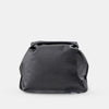 charcoal waterproof toiletry case on light gray background