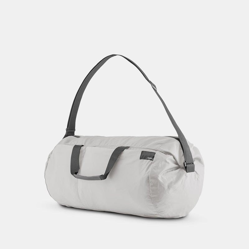 3/4 view of arctic white duffle on white background