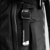black gear tag hanging off black backpack loop