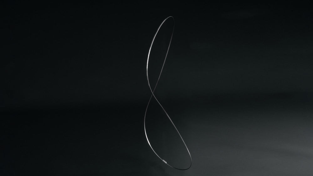 Spring steel frame on black background