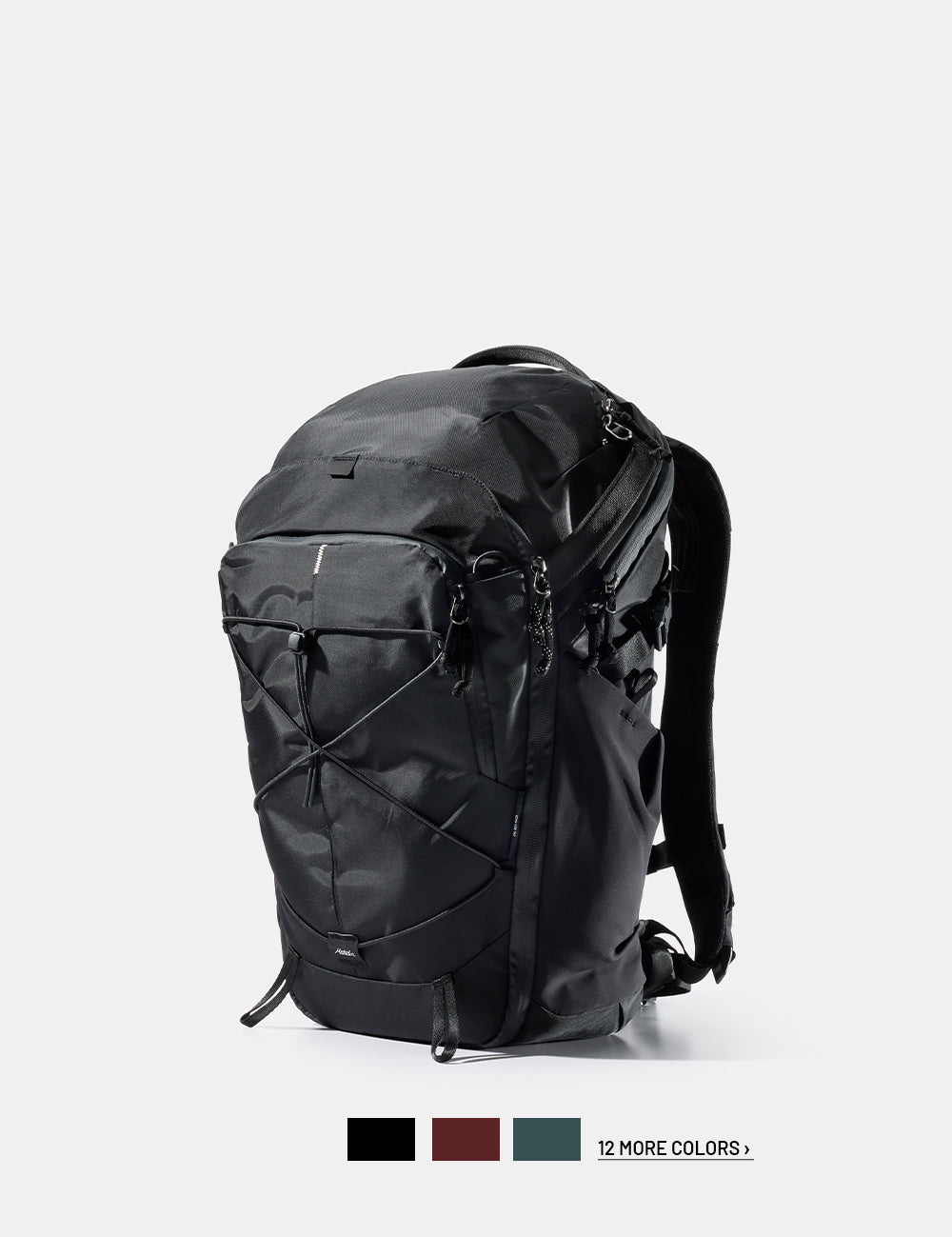 Black backpack on a white background with 3 color swatches and text that reads "12 more colors"