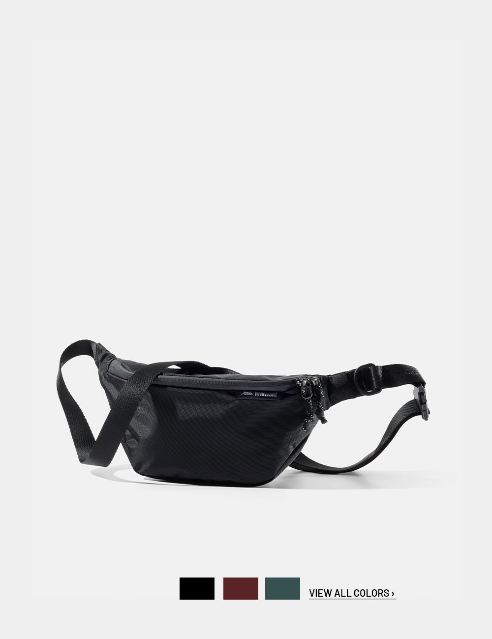 Black sling on a white background with 3 color swatches and text that reads "view all colors"
