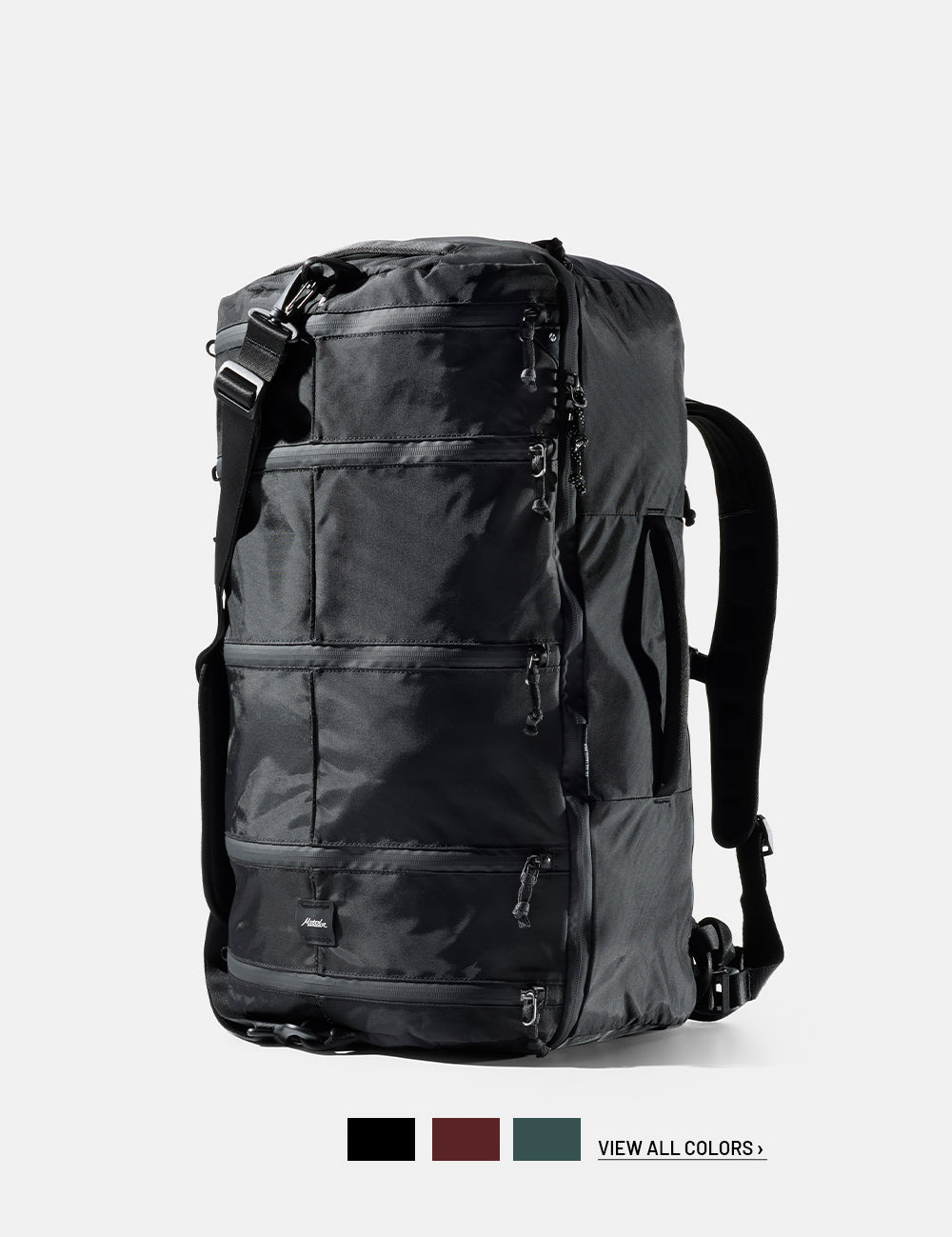 Black backpack on a white background with 3 color swatches and text that reads "view all colors"