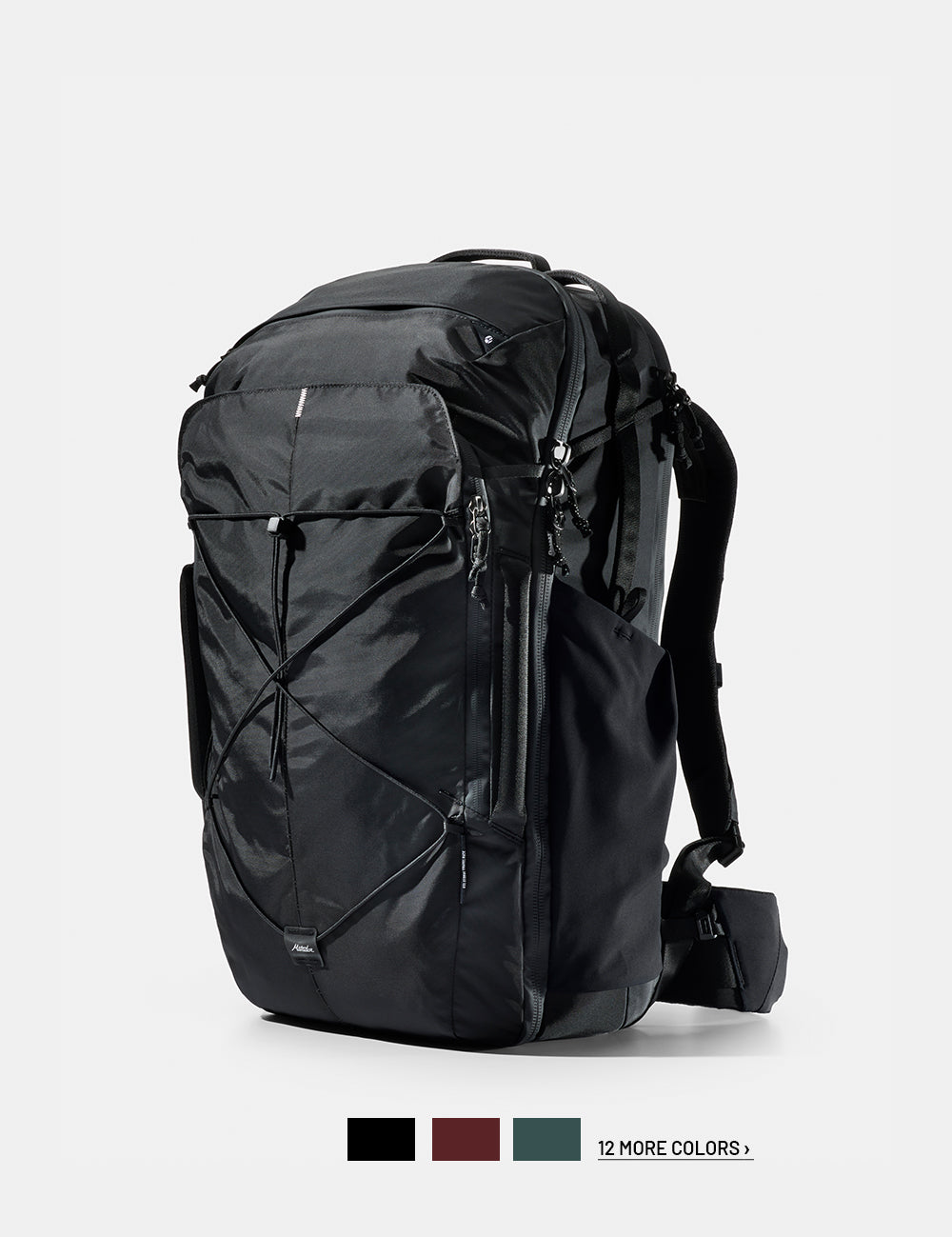 Black backpack on a white background with 3 color swatches and text that reads "12 more colors"