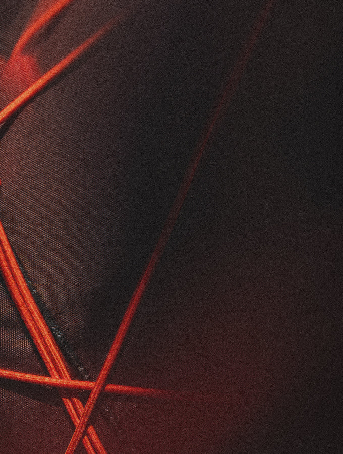 close up view of garnet bags with bright orange cord