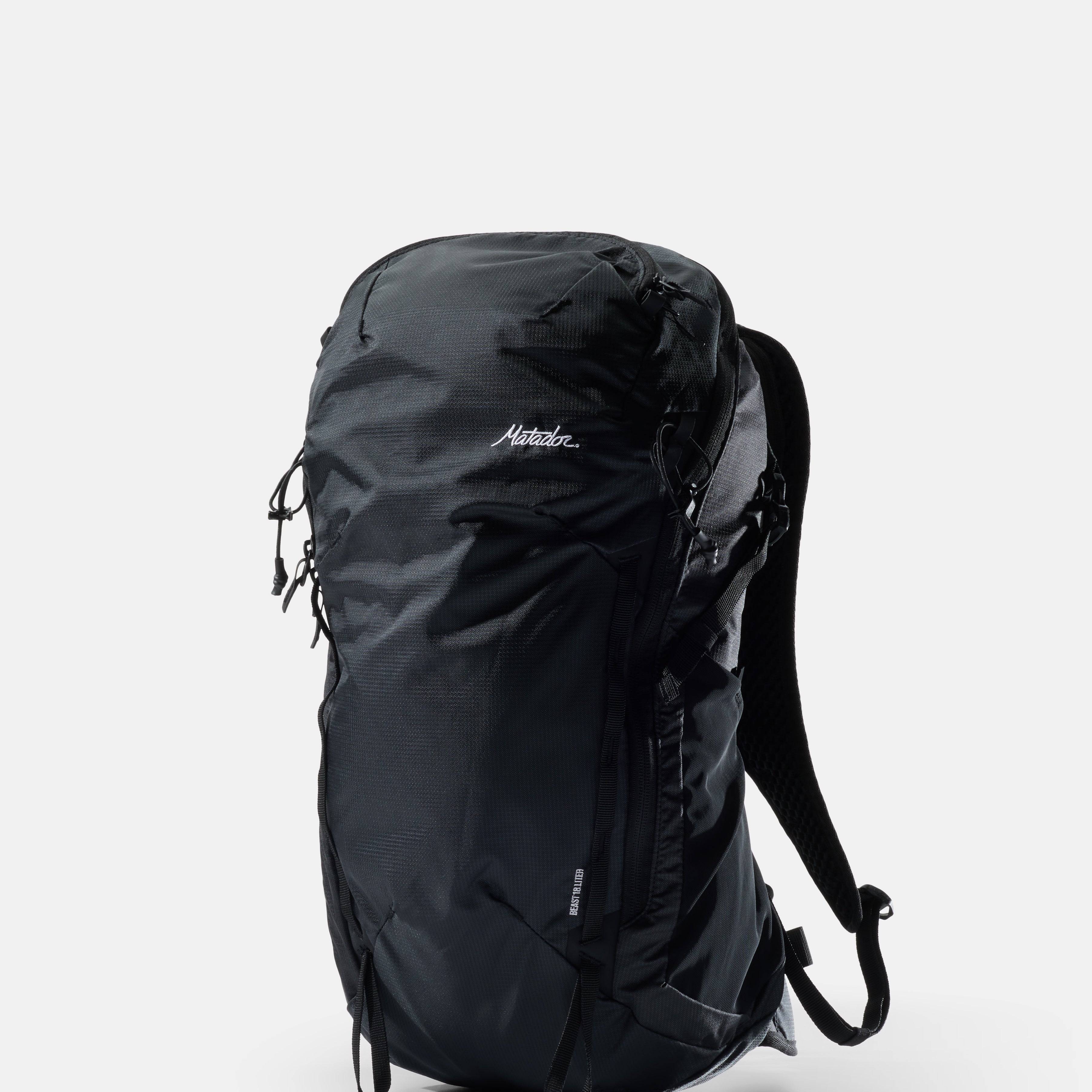 Black backpack on a white background