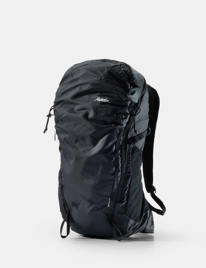 Black backpack on a white background