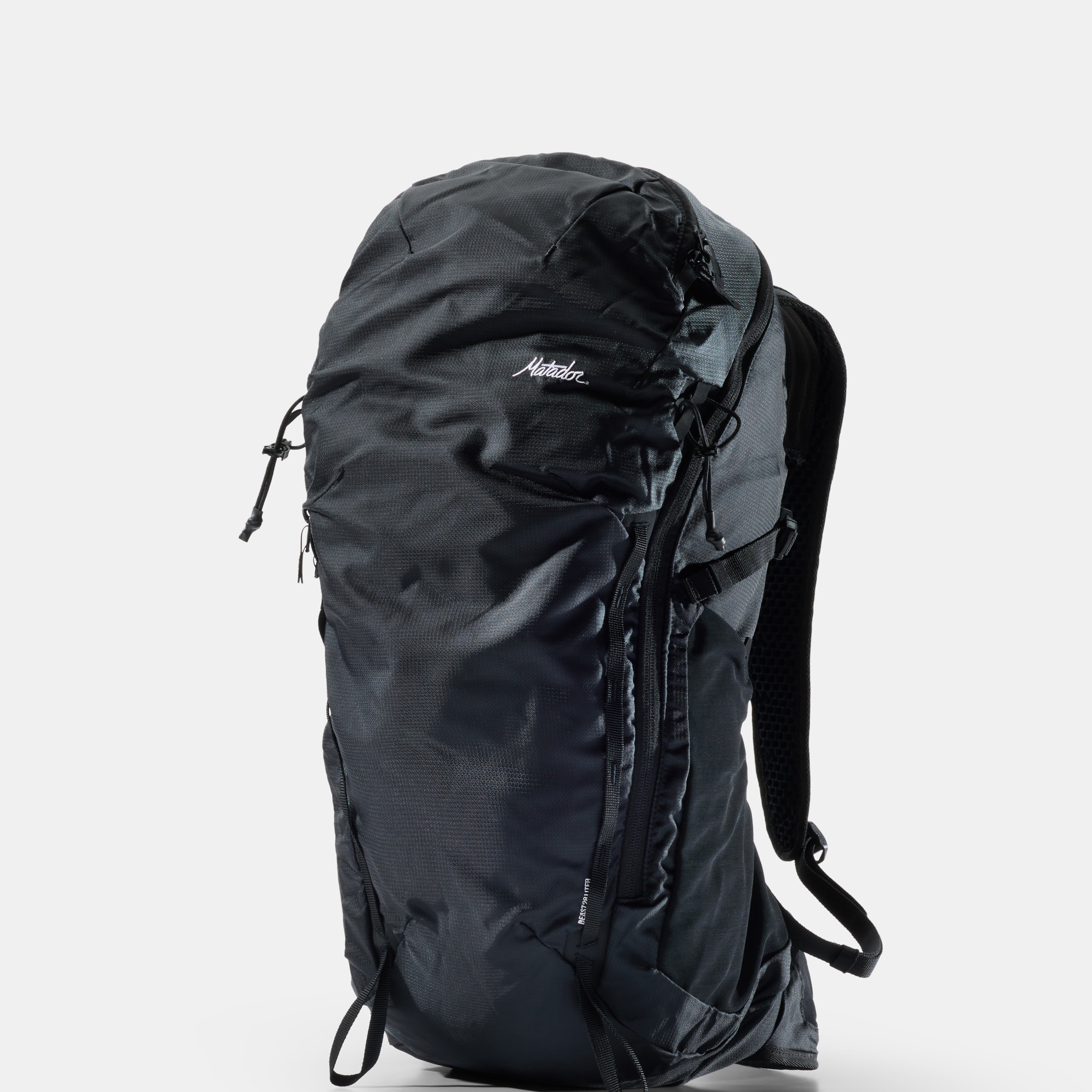 Black backpack on a white background