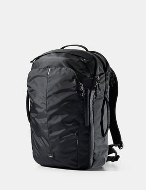 Black backpack on a white background