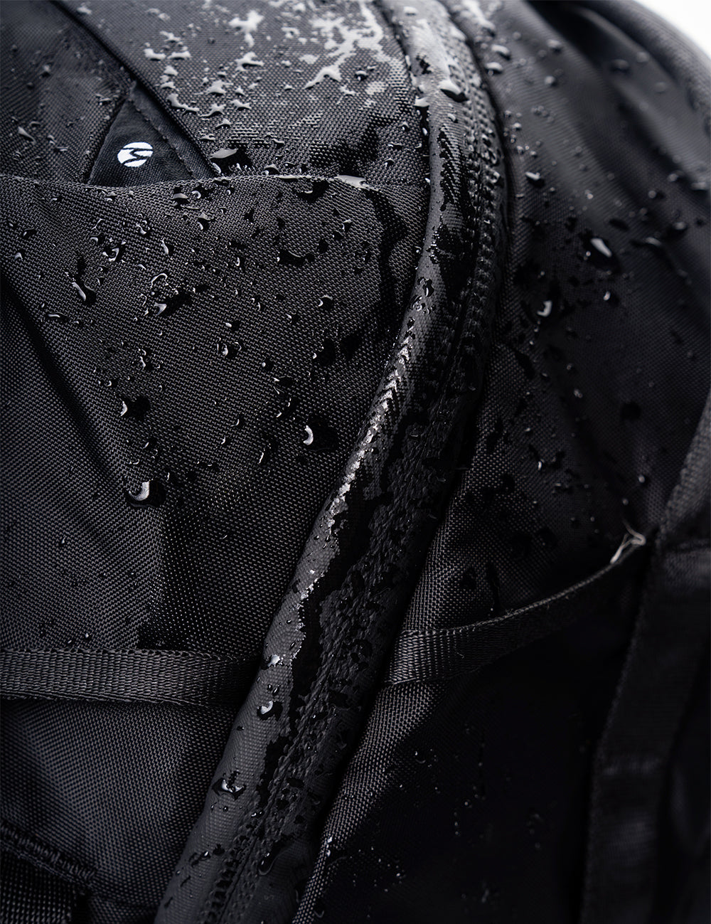 water droplets on black fabric
