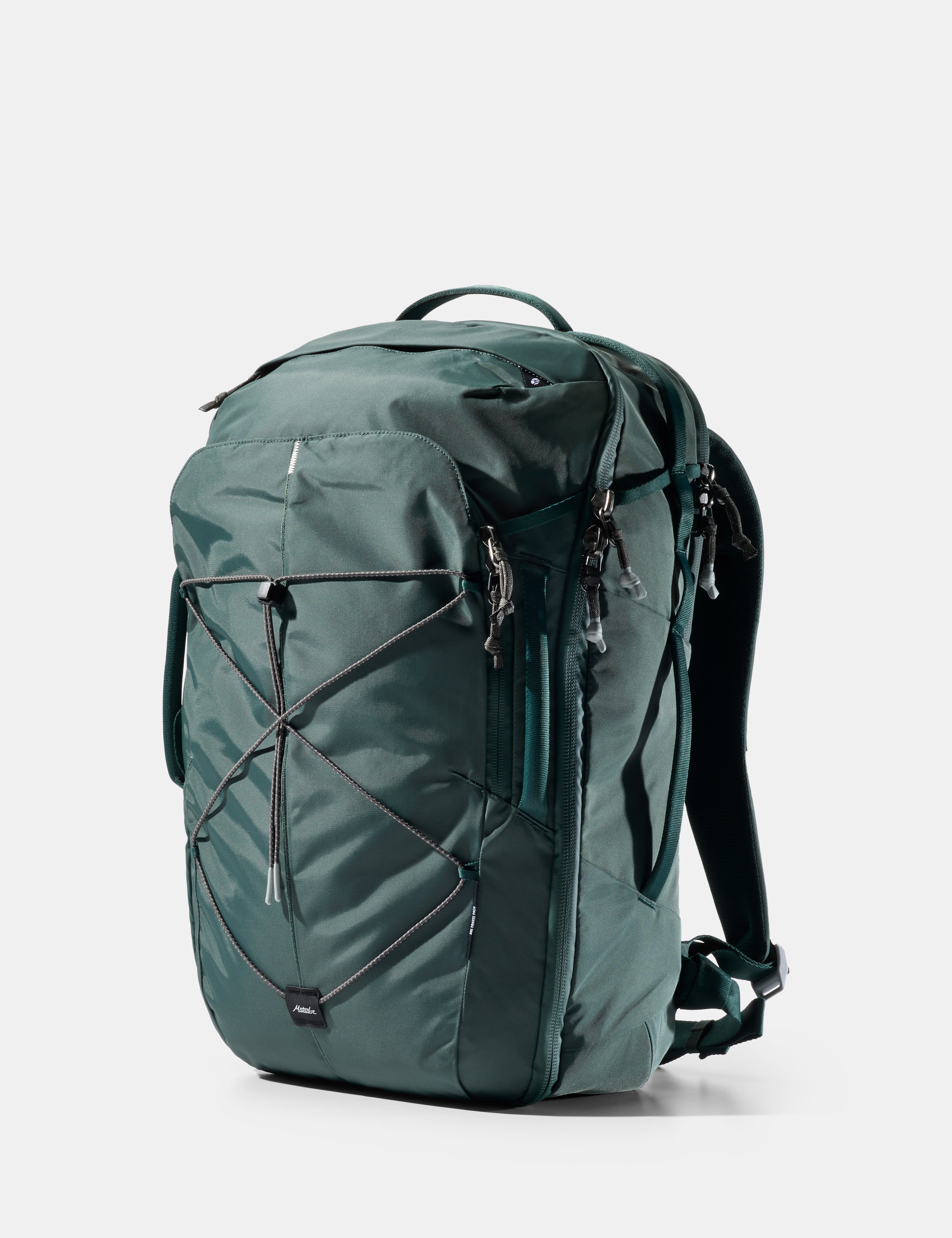 Green backpack on a white background