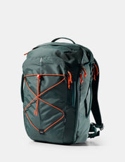 Green backpack with orange accents on a white background
