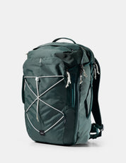 Green backpack  on a white background