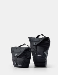 Two black camera base layers with visible branding on a white background