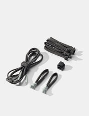Set of black cord and zipper pullers on a white background