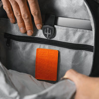 detail view of orange patch on inside of backpack
