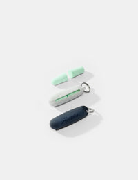 earplugs and 2 keychain pouches on white background