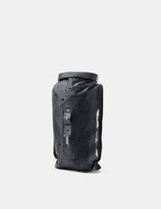 Black waterproof bag with water droplets on a white background