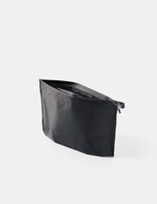Black zippered toiletry case on a white background