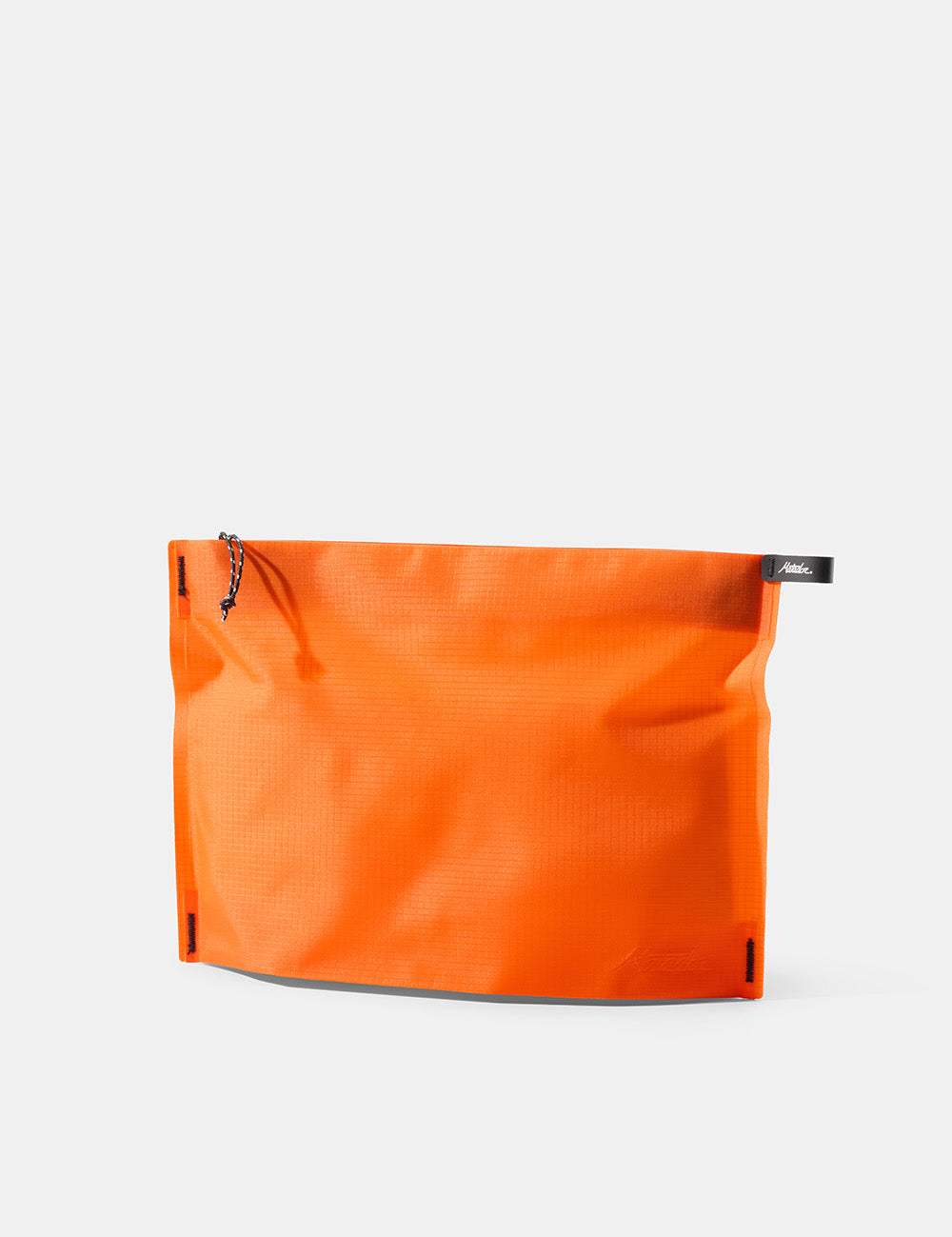 Orange zipper toiletry case on a white background