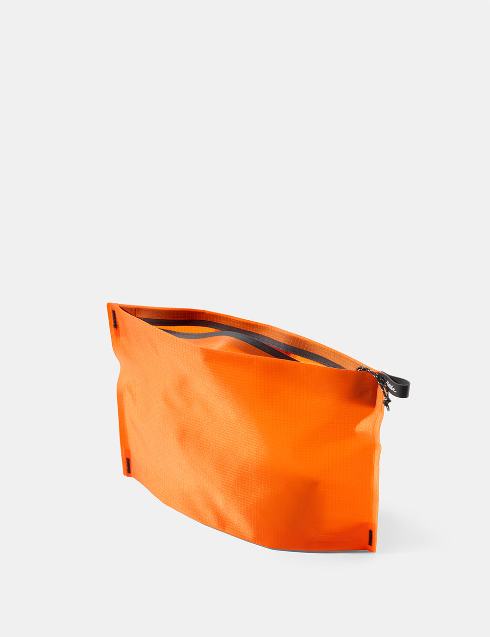 Orange zipper toiletry case on a white background