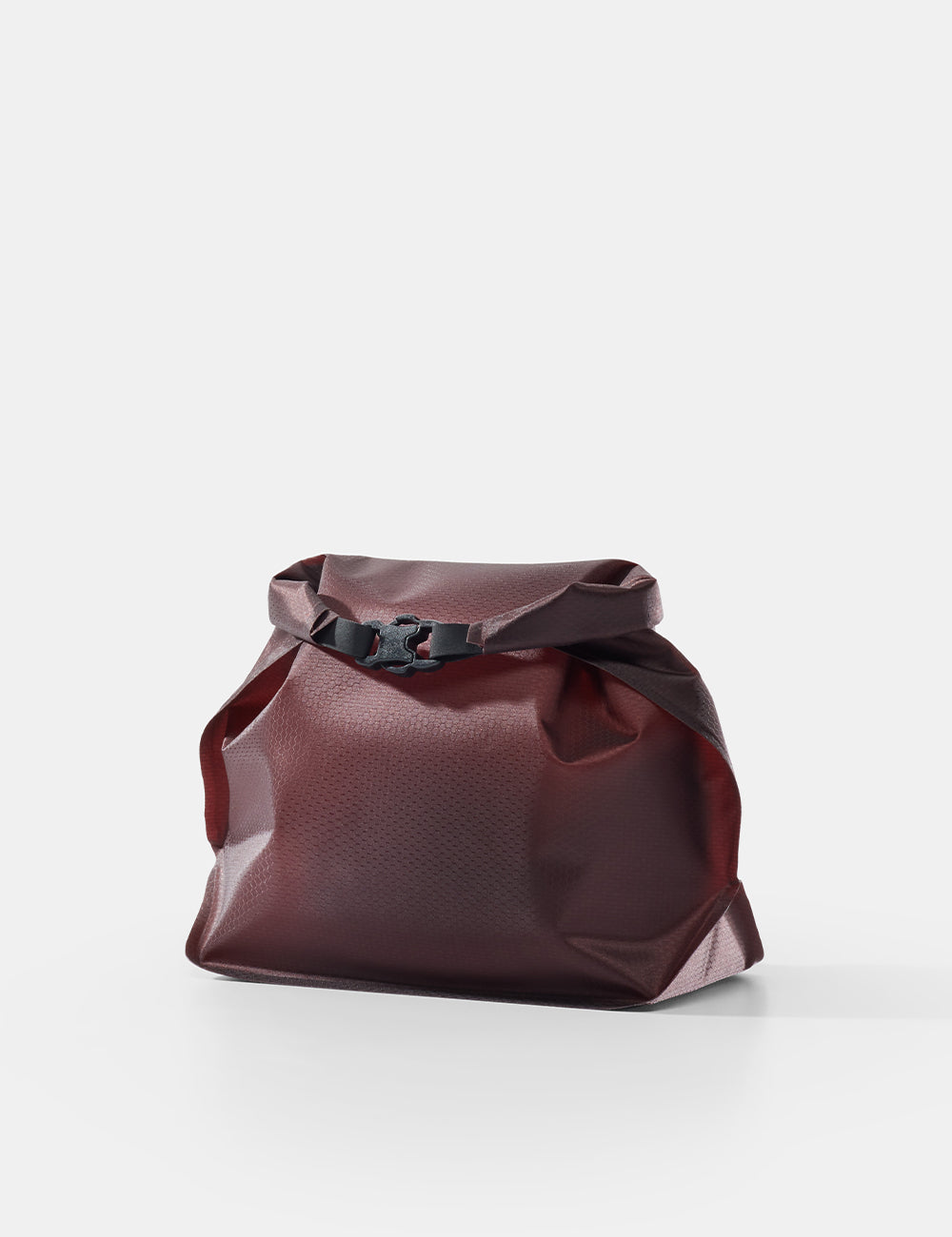 garnet toiletry case on a white background