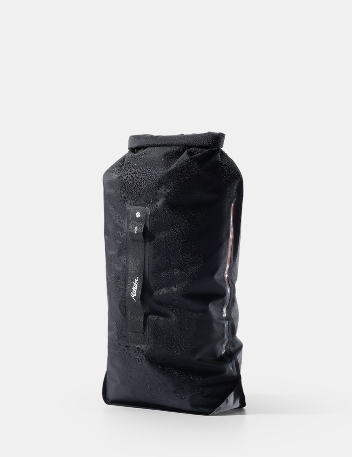 Black dry bag with a brand logo on a white background
