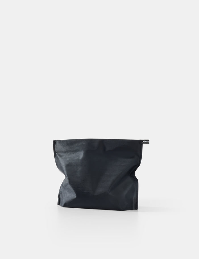 Black toiletry case on a white background