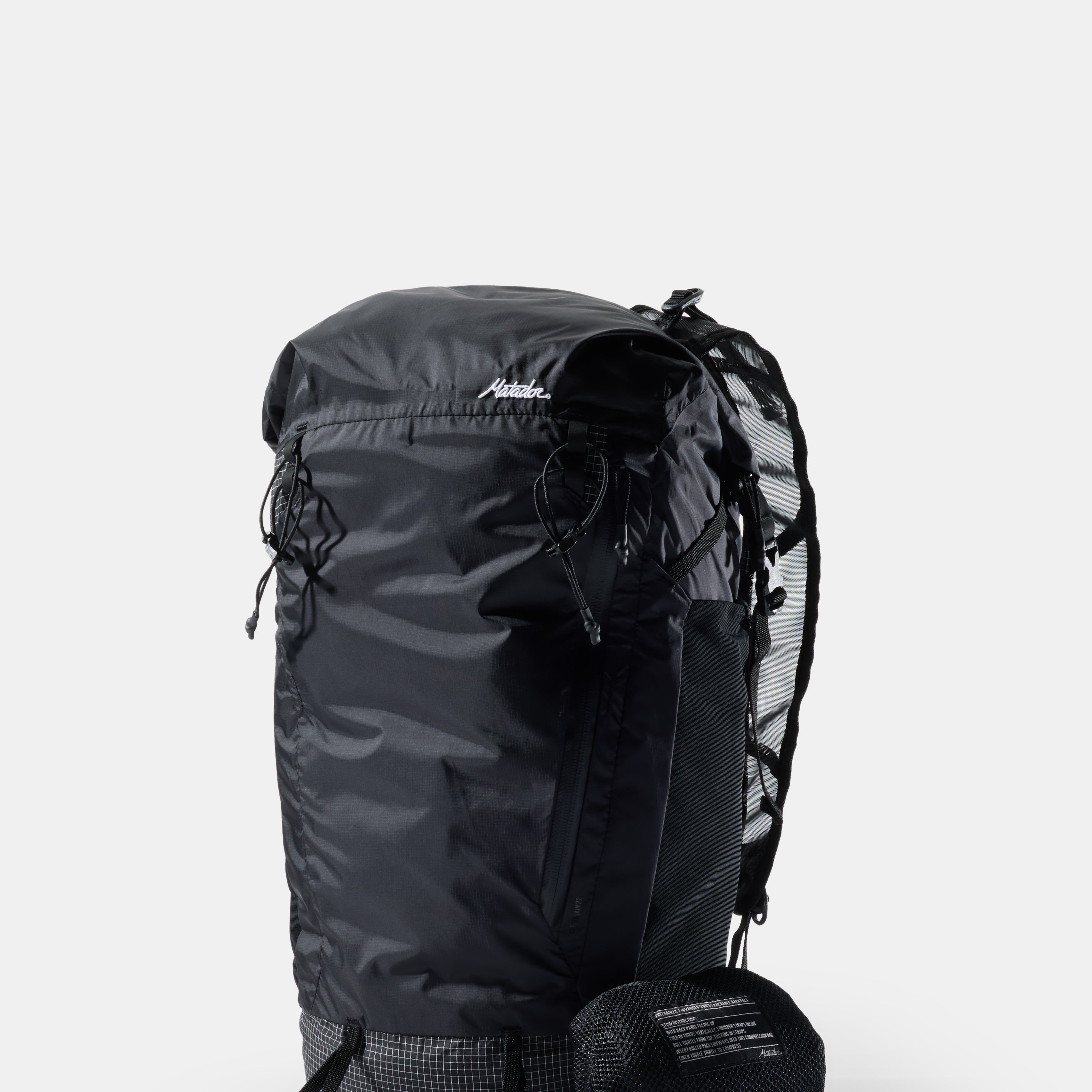 Black backpack on a white background