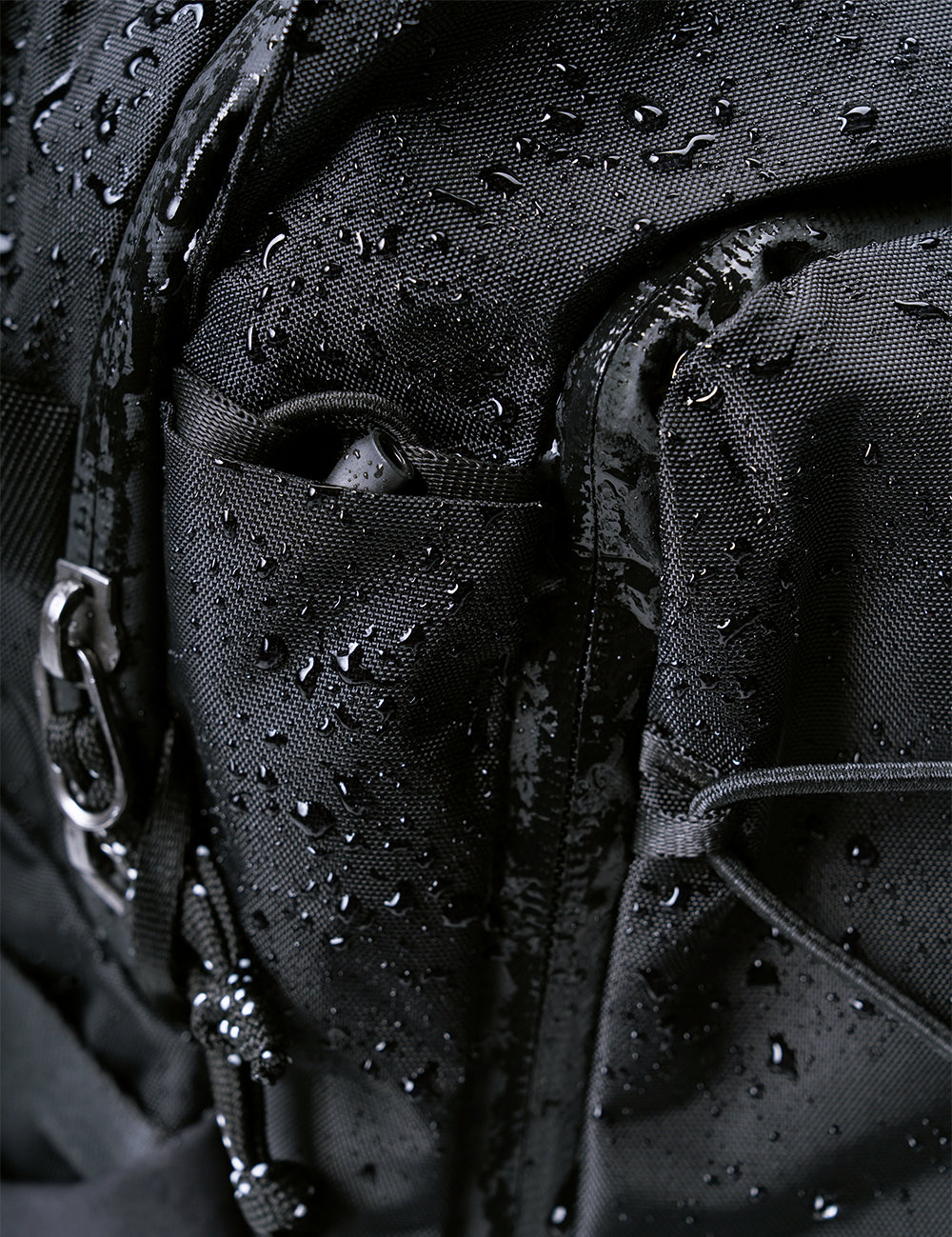 water droplets on black fabric