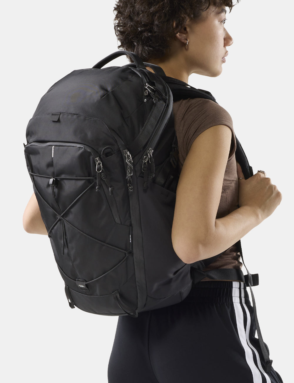 person wearing black backpack