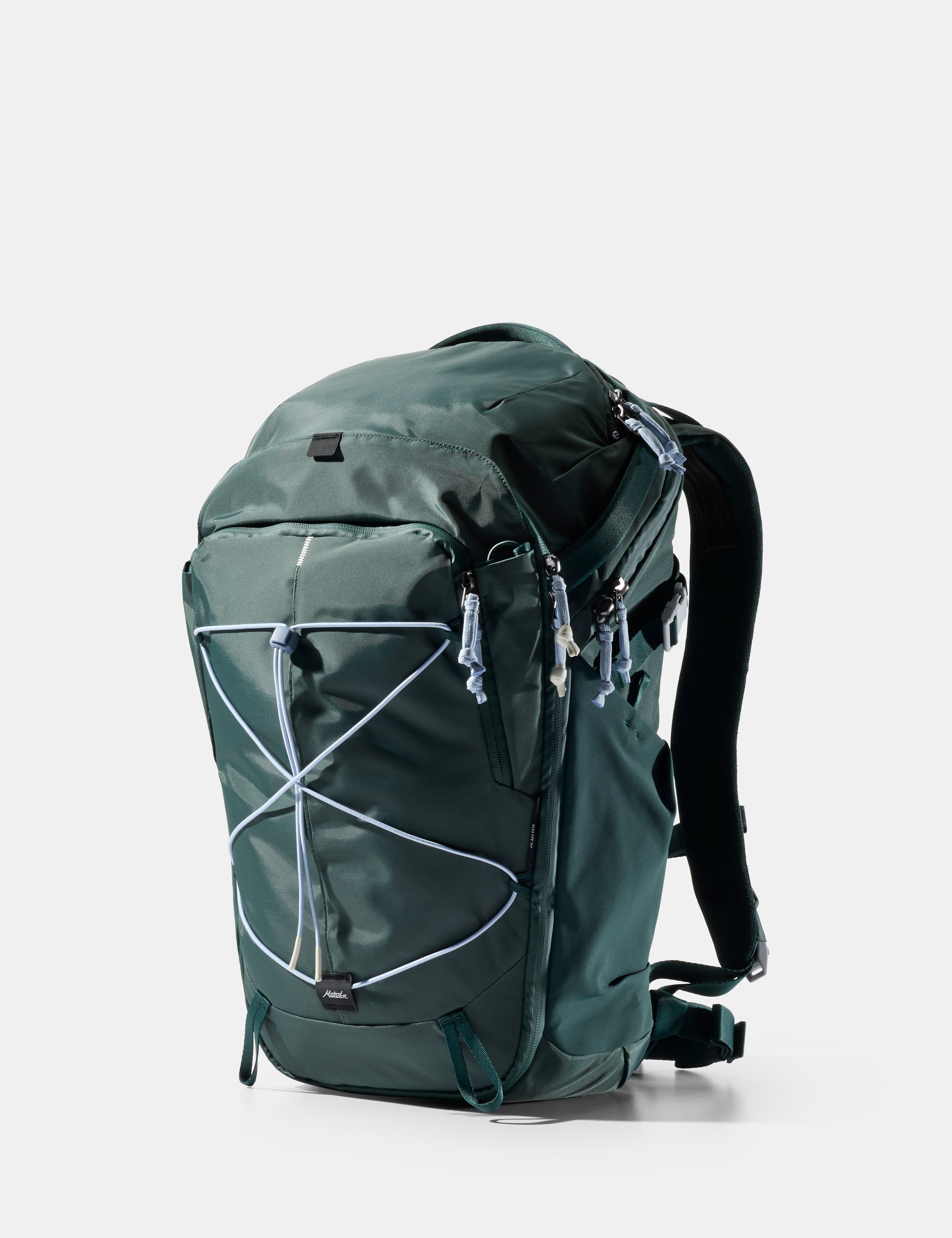 Green backpack on a white background