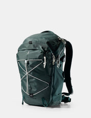 Green backpack on a white background