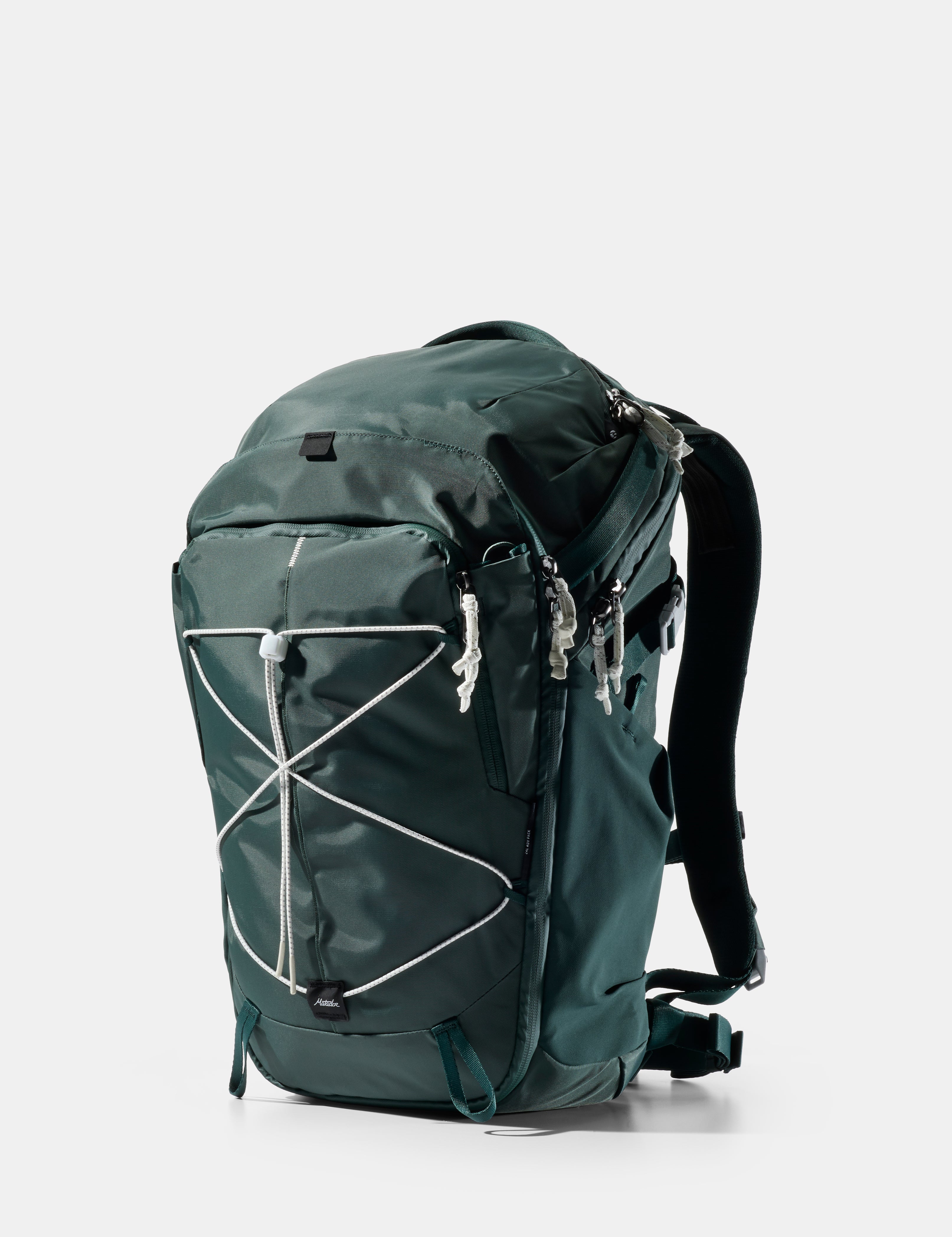 Green backpack on a white background