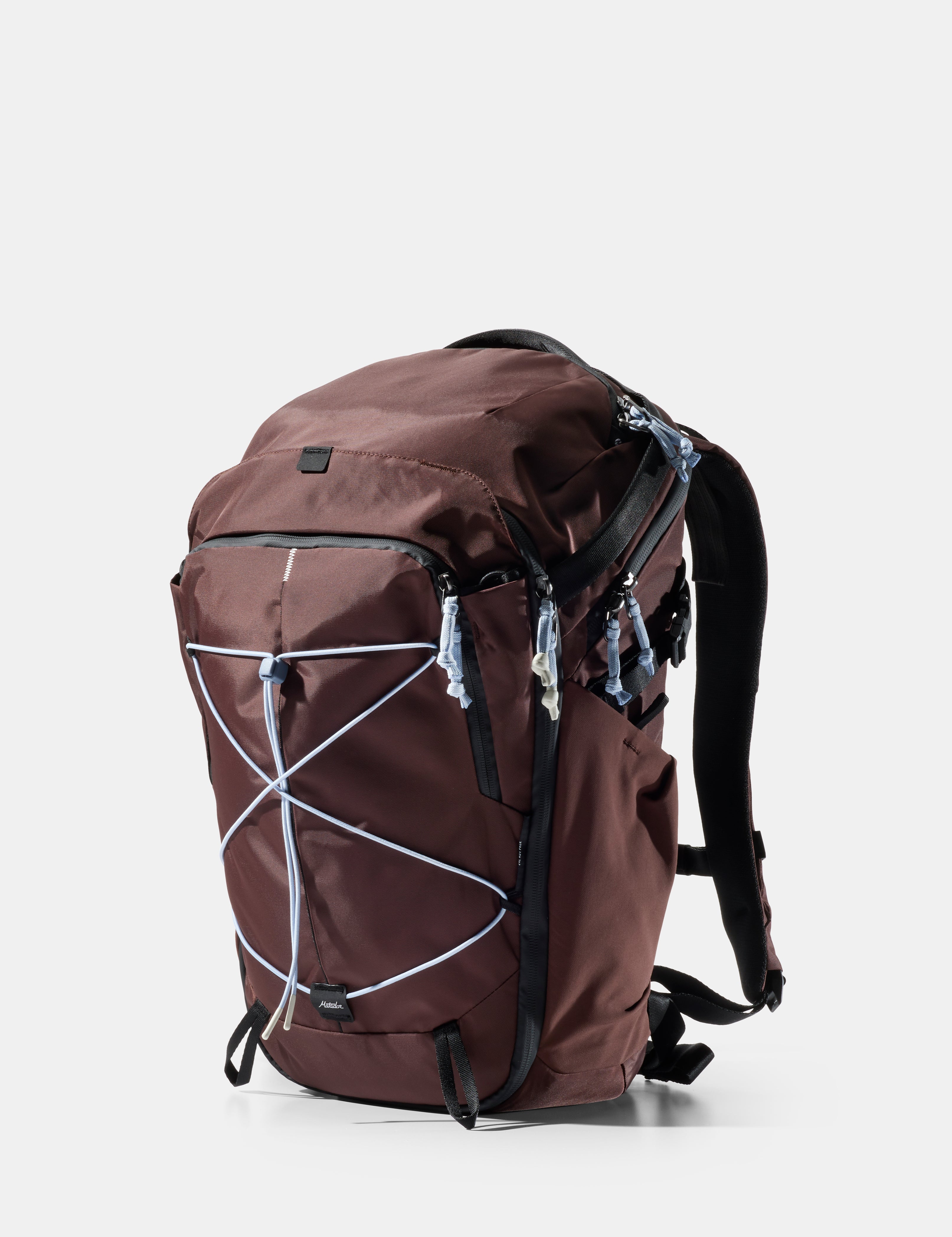 garnet backpack with light blue straps on a white background