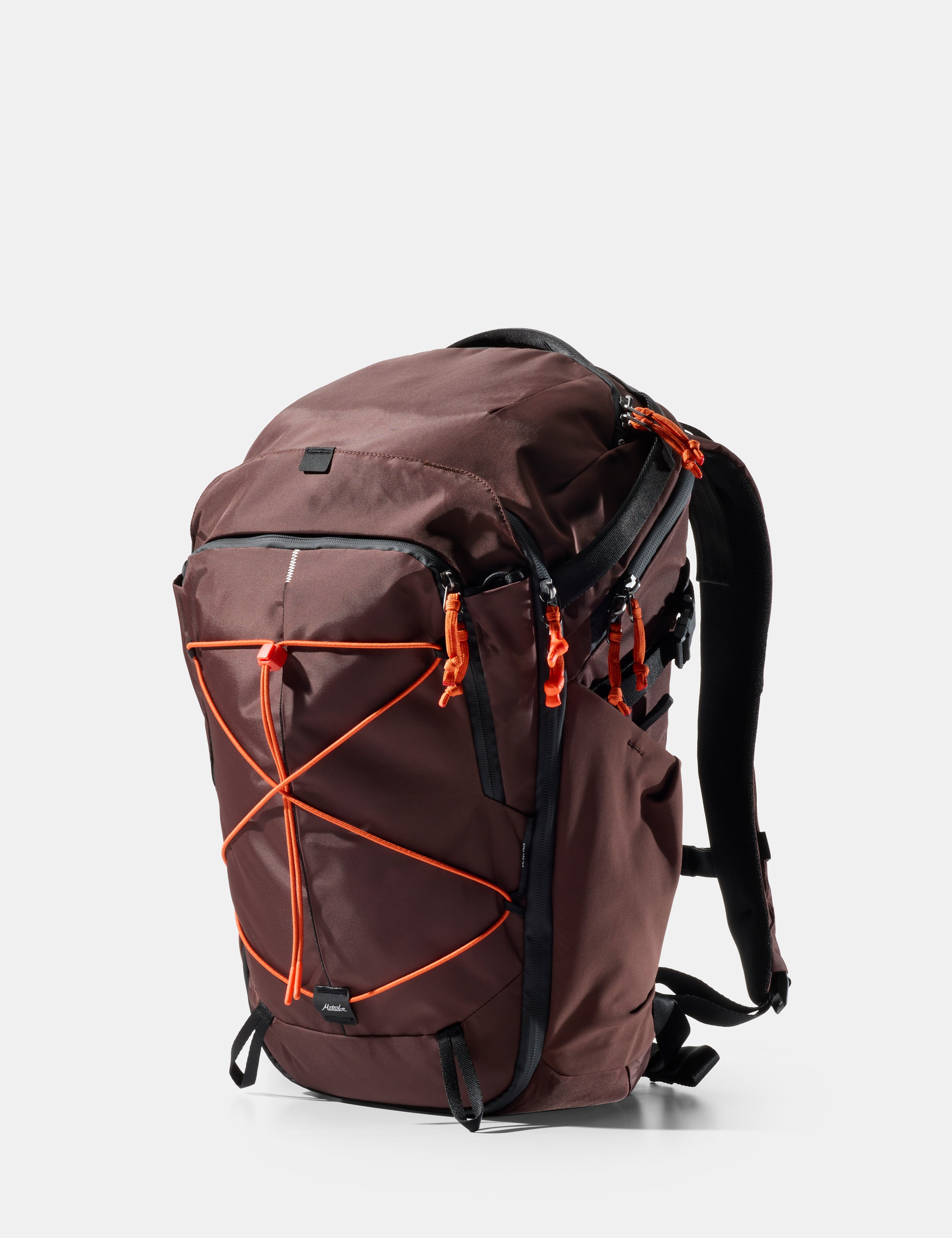 garnet backpack with orange straps on a white background