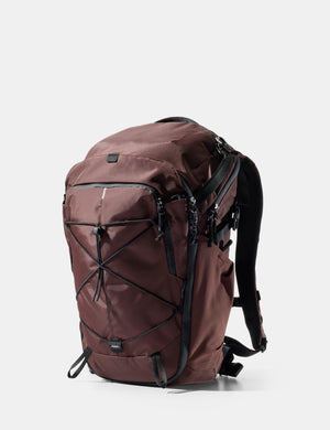 garnet backpack with black straps on a white background
