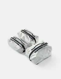 3 white gear cubes on white background