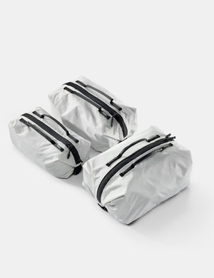 3 white gear cubes on white background